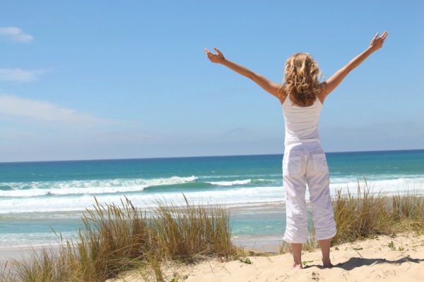 Lady in a white top at the beach